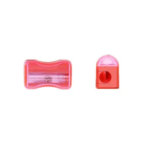 Creative bread-shaped mini manual pencil sharpener in translucent red plastic