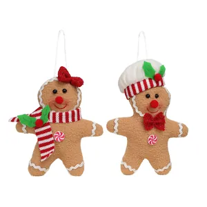Gingerbread man Christmas ornaments set of two with red bow and chef hat for holiday tree decor