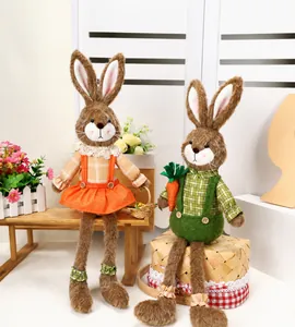 Detailed close-up of seated plush Easter bunnies in plaid outfits with long soft legs