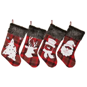 Set of four plaid Christmas stockings with plush fur trim and festive cartoon patterns