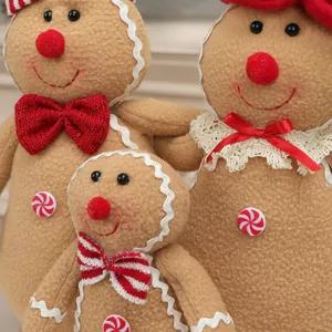 Set de 3 peluches de hombre de jengibre con lazos rojos para decoración navideña
