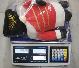 Detailed weight measurement showing 292.8g for the Christmas Gnome plush soldier doll