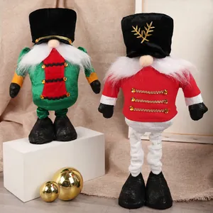 Pair of festive Christmas soldier gnomes in red and green velvet with nutcracker details