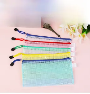 Detailed view of colorful translucent mesh zipper bags for A4 document storage