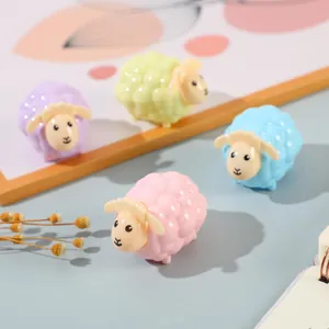 Creative sheep-shaped dual-hole pencil sharpeners in four pastel colors on a desk