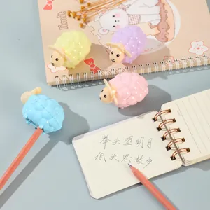 Detail of sheep-shaped pencil sharpeners in four macaron colors with wood pencils