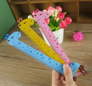 Close-up of 15cm giraffe rulers with wavy edge and cute patterns in three colors