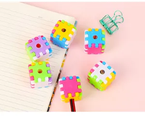 Close-up of colorful cube building block pencil sharpener for student stationery