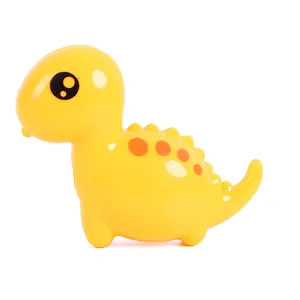 Cute yellow cartoon dinosaur pencil sharpener for students with vibrant orange spots