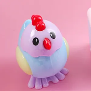 Detail view of the colorful cute chick pencil sharpener showing plastic material textures