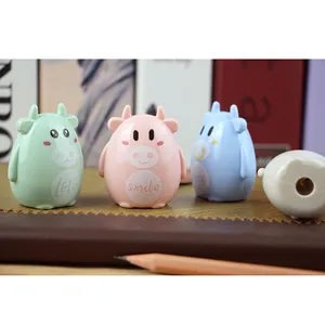 Manual cartoon cow pencil sharpener for students in pink blue green and white colors