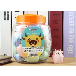 Jar of 36 cute cartoon cow pencil sharpeners in assorted pastel colors for students