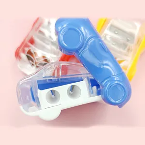 Cartoon car pencil sharpener with dual holes in multiple colors on pink background