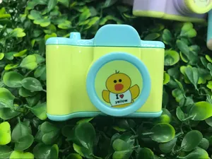 Detailed close-up of a creative camera-shaped pencil sharpener with a cute yellow duck icon