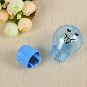 Creative light bulb shaped pencil sharpener with light blue transparent shell and smile face