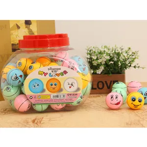 Detailed view of clear jar containing 60 colorful cartoon smiley face pencil sharpeners