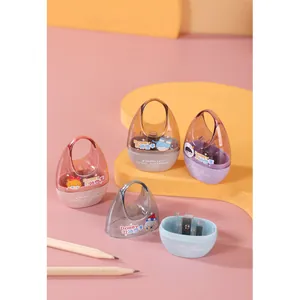 Creative egg-shaped handheld pencil sharpener in macaron colors with a clear top cover
