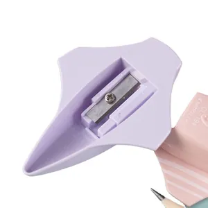 Sacapuntas manual con forma de avión lavanda y cuchillas metálicas para estudiantes
