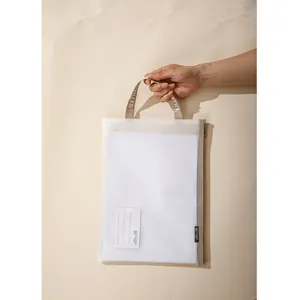 Detail of A4 mesh file bag with durable zipper handle and clear identification slot