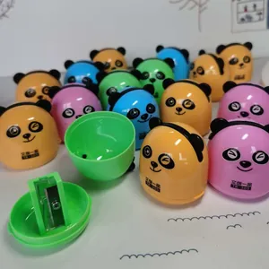 Macro detail of cartoon panda pencil sharpeners in various colors for students