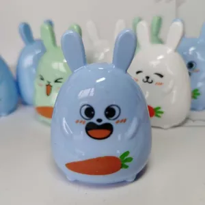 Detail view of colorful cartoon rabbit pencil sharpeners with cute facial expressions