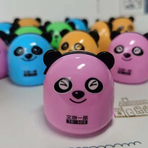 Close-up of cute panda-shaped pencil sharpener available in pink, blue, and yellow colors