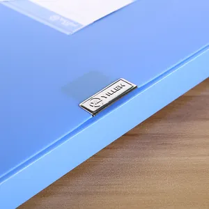 Close-up of durable blue PP file box with a silver metal clasp and clear label slot