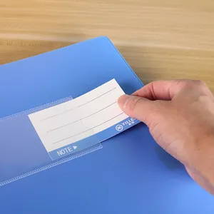 Detail of hand inserting a note card into the clear pocket on blue PP file storage box