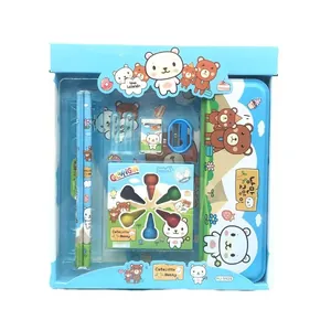 Blue stationery set for kids including pencils, crayons, and metal box for school