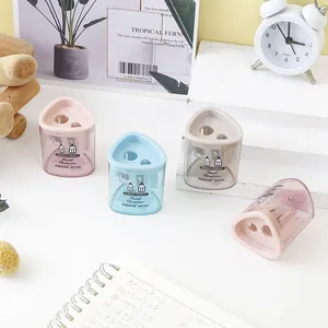 Detail view of dual-hole pencil sharpener for 8mm and 12mm pencils in pastel colors