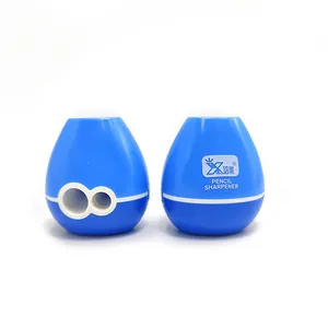 Manual dual-hole pencil sharpener in blue and white with a round egg-shaped design