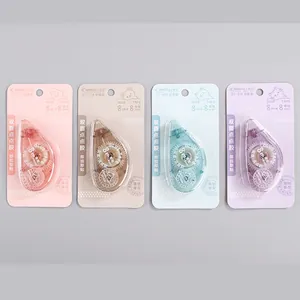 Detailed view of macaron glue tape pens in four colors with 8m x 8mm capacity