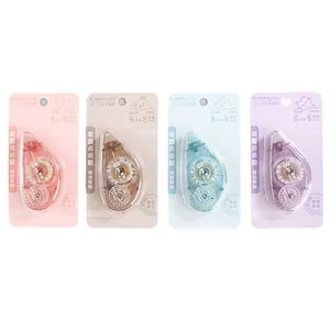 Set of 4 colorful handheld glue tape rollers in macaron colors for office and DIY