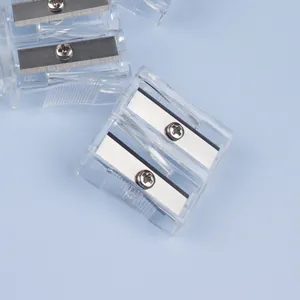 Clear dual-hole pencil sharpener with durable metal blades in a minimalist plastic design