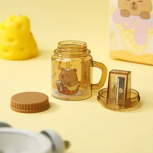 Mini Capybara milk tea cup pencil sharpener with transparent amber plastic housing