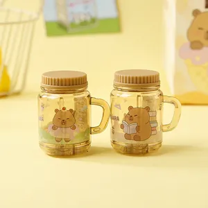 Detail of cute capybara cartoon pencil sharpeners in amber translucent cup design