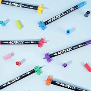 Vibrant acrylic marker set showing assorted colors and dual tips on light blue backdrop