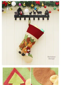Detail of Christmas reindeer stocking with textured fabric appliques and hanging loop