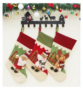 Three-piece Christmas stockings set featuring 3D Santa, Snowman, and Reindeer plush figures