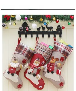 Three-piece set of large Christmas stockings with Santa, Snowman and Reindeer dolls