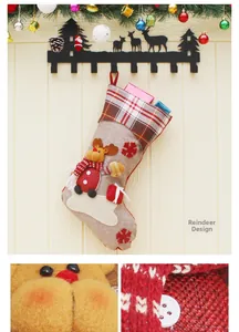 Macro detail of Christmas reindeer stocking with burlap texture and 3D plush doll design