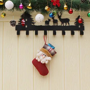 Black metal reindeer wall rack with 8 hooks featuring a festive Christmas stocking display