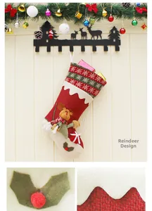 Detalle de calcetín navideño de alta calidad con reno de felpa 3D y adorno de copos de nieve