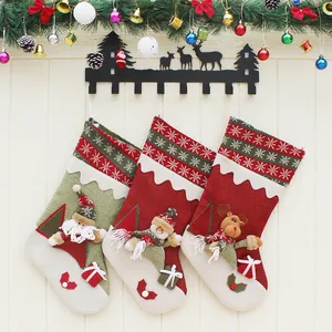 Three-piece Christmas stocking set featuring 3D Santa, Snowman and Reindeer on rack