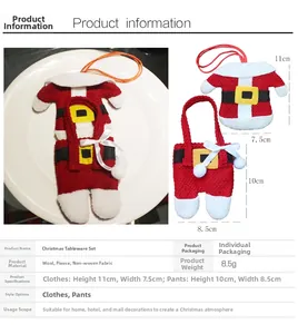 Detailed view of red and white Christmas cutlery holders in shirt and trousers shapes