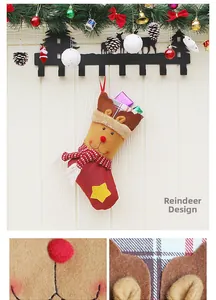 Detail view of a reindeer style Christmas stocking with 3D antlers and plush textures