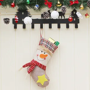 Hanging burlap Christmas stocking with 3D snowman, festive plaid cuff and gift boxes