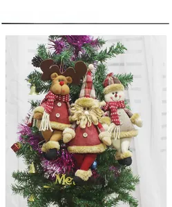 Three plush Christmas tree ornaments featuring Santa, snowman, and reindeer figures