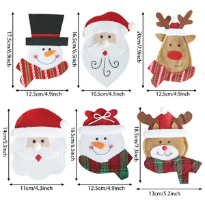 Set van 6 kerstbestekhouders van vilt met ontwerpen van de kerstman, sneeuwpop en rendier