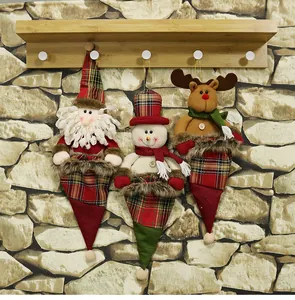 Detailed view of Santa, Snowman and Reindeer ornaments hanging on a rustic wooden rack